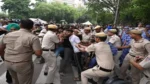 Parliament March News: संसद मार्च के दौरान प्रदर्शनकारियों और पुलिस में झड़प, लाठीचार्ज के बाद कई हिरासत में
